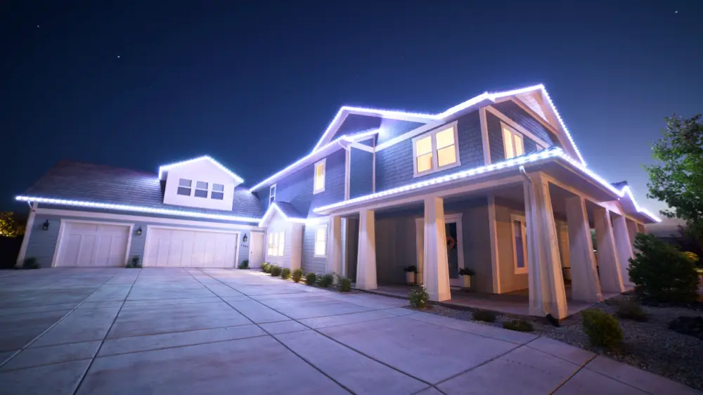 Large Utah County home at night with crisp white Canyon Clear permanent LED lighting tracing the rooflines and gables