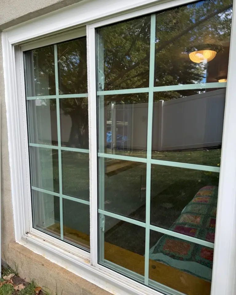 Window glass after Canyon Clear removed the hard-water stains